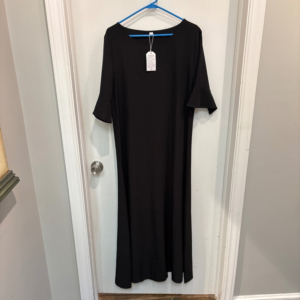 Black sheath dress.  Never worn